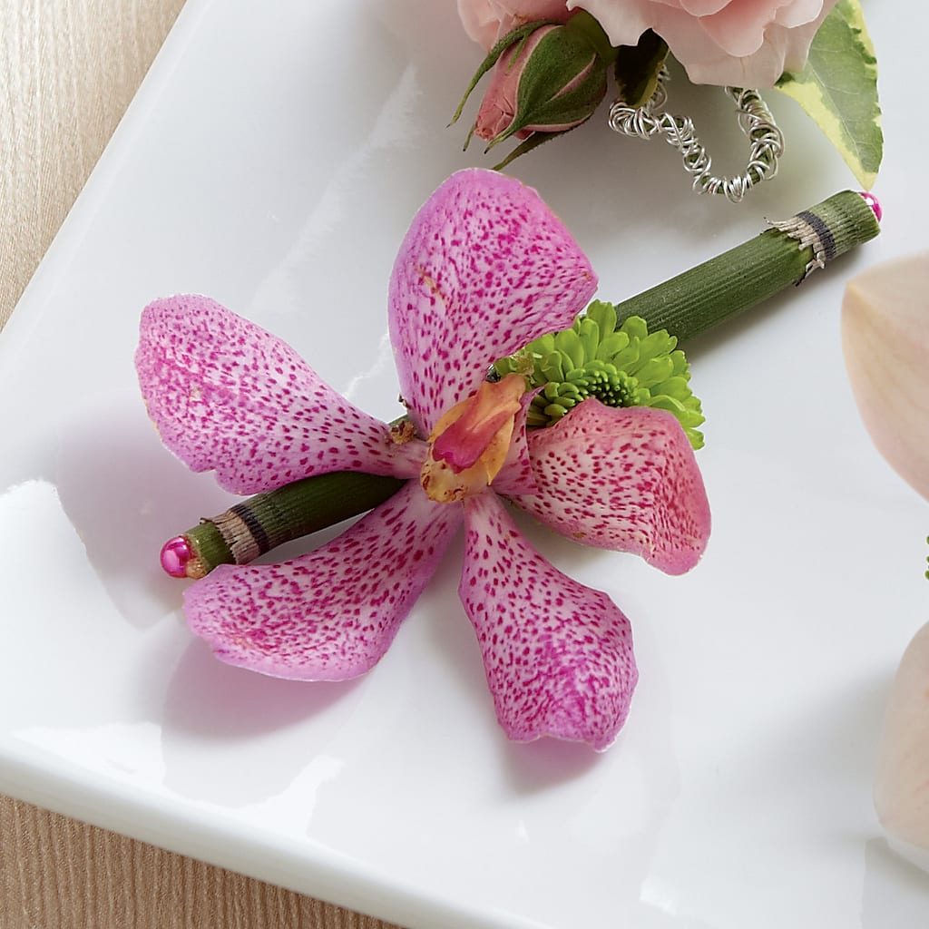 Pink Mokara Boutonniere – BILLY'S WITTENBERG FLORAL, Wittenberg WI